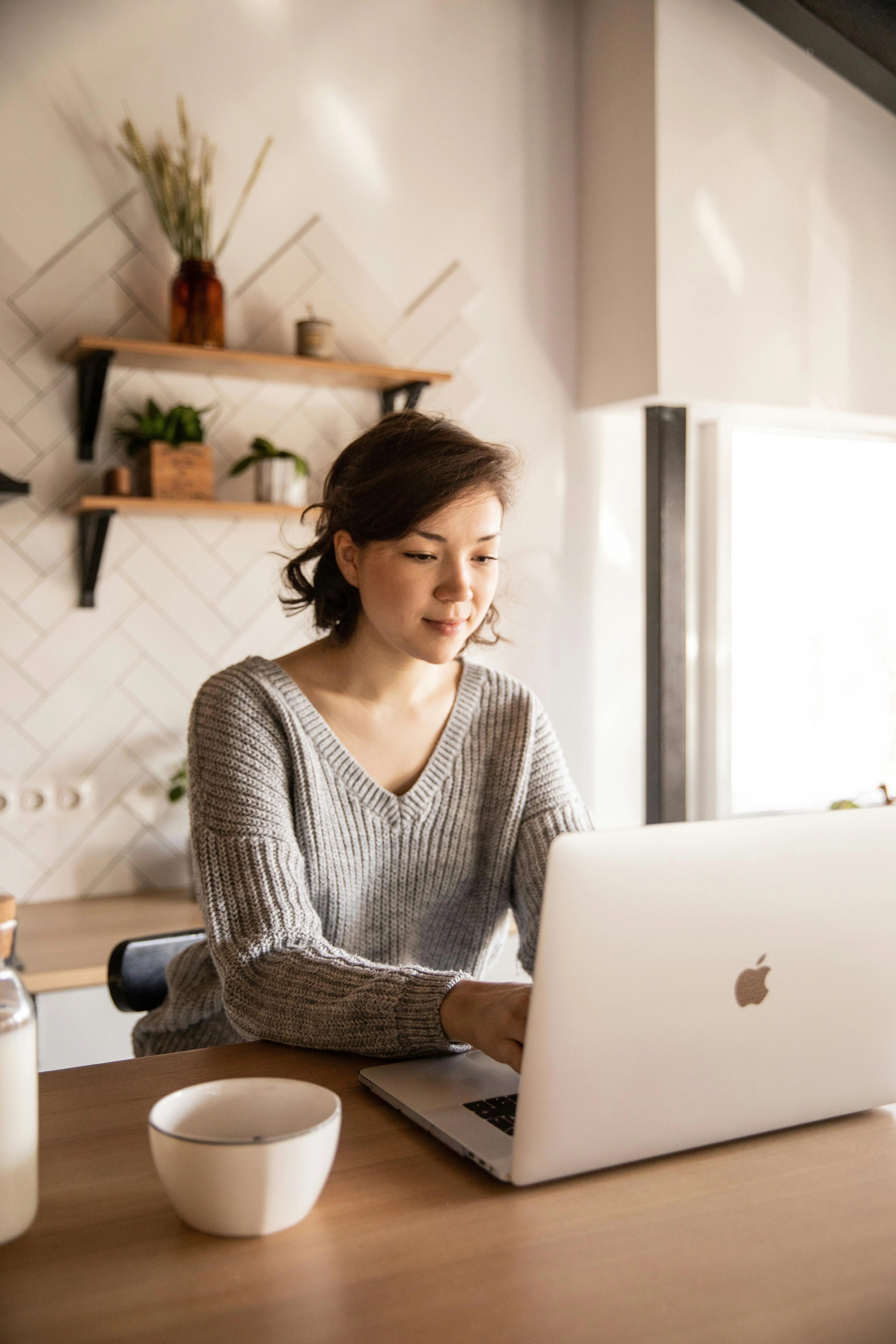 A woman using a laptop
